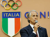 International Olympic Committee President Thomas Bach and the Italian Olympic Committee (CONI) President Giovanni Malago', attend a press conference for Italian Olympic Committee-CONIs 100th anniversary in Rome, Monday, June 9, 2014. (AP Photo/Gregorio Borgia)